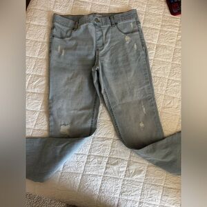 Distressed Light Blue Jeans